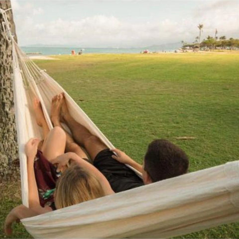 couple in hammock at beach