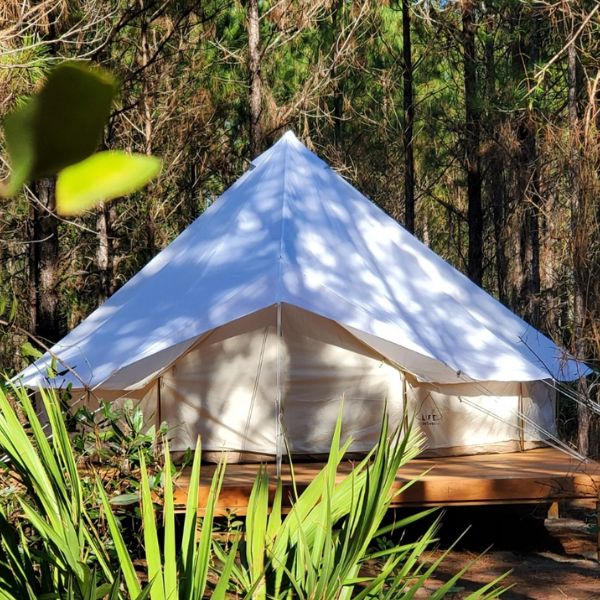 bell tent on deck with fly cover